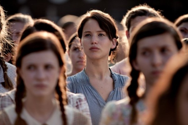 Katniss - clear, in focus, a disconnect from any identity she may have had, she is now female tribute for District 12.